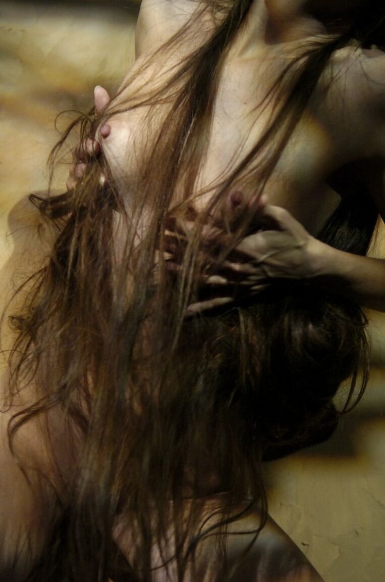 15P Solo model Enigma sports really long hair while getting naked in poor light
