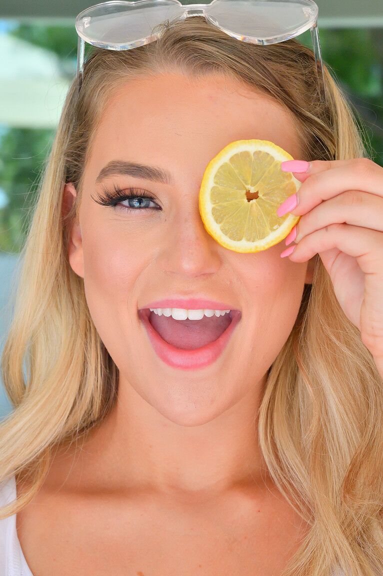15P Blonde model Blake douses her great tits in lemonade before toying her pussy