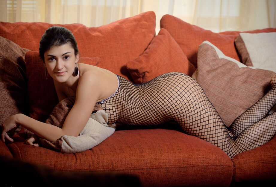 16P Young Zita B in fishnet catsuit spreading & stretching to show her tight ass