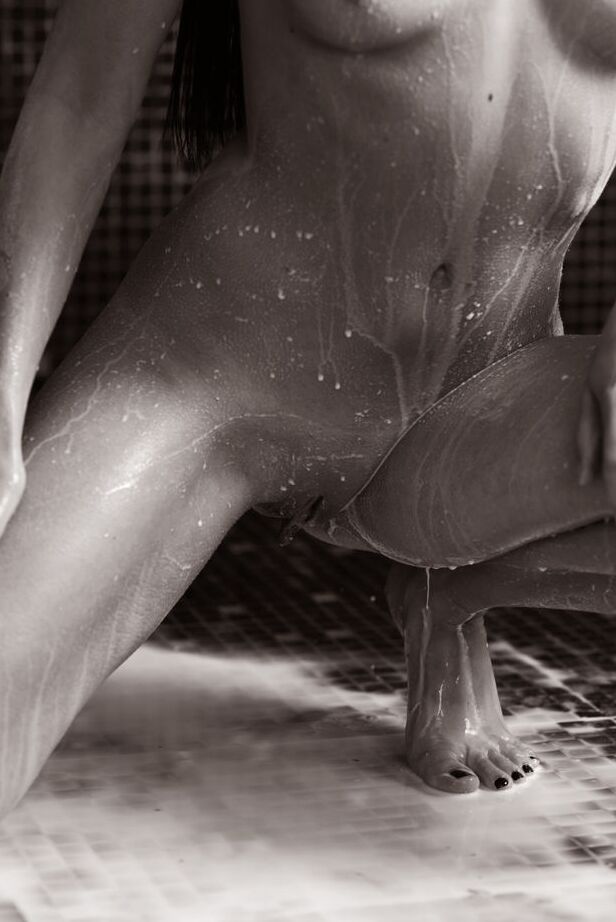 16P Young brunette Veronica Snezna covers her naked body in milk in a shower