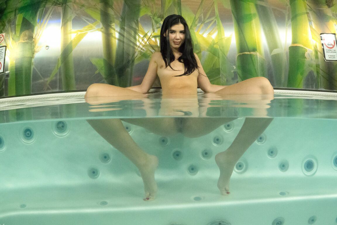 21P Beautiful Czech teen Lady Dee strips and spreads her long legs in the pool