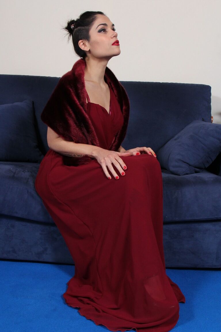 12P Alluring brunette Chiara shoves the soles of her feet after removing her heels