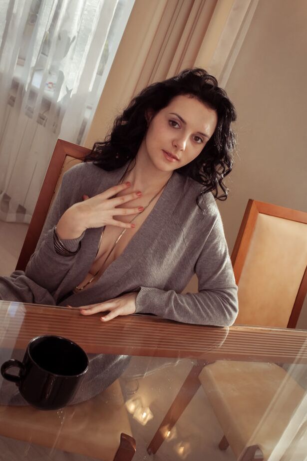 18P Brunette with big nipples strips at the breakfast table to show closeup twat