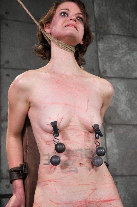 16P Young white girl Hazel Hypnotic is subjected to humiliating acts in a dungeon