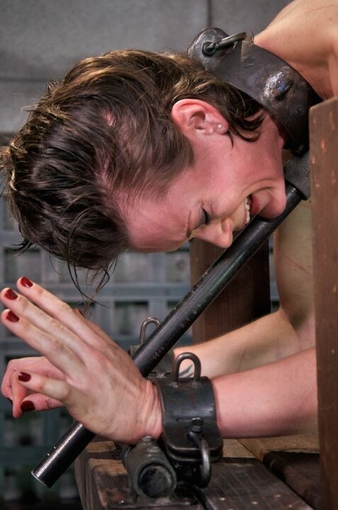 16P Young white girl Hazel Hypnotic is subjected to humiliating acts in a dungeon
