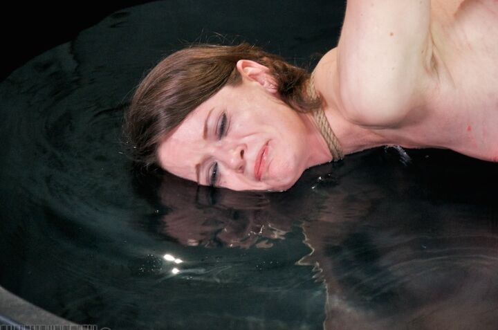16P Young white girl Hazel Hypnotic is subjected to humiliating acts in a dungeon