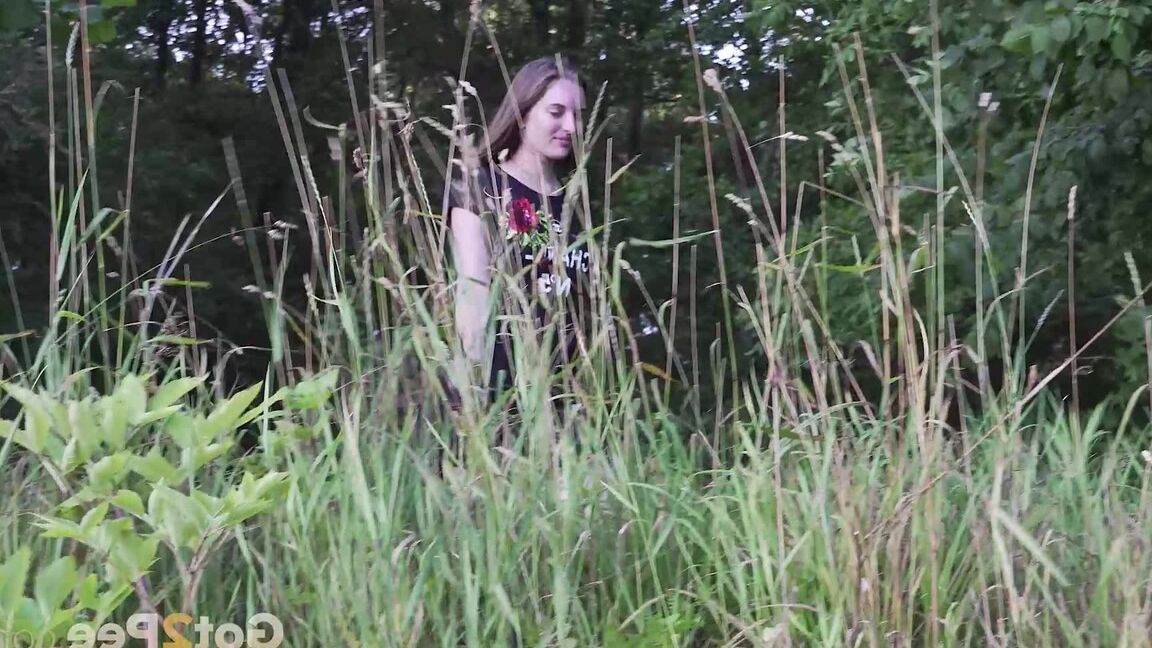 15P Caucasian girl Vika squats for a piss not too far from a big house