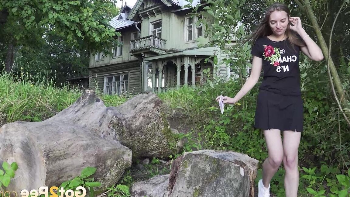 15P Caucasian girl Vika squats for a piss not too far from a big house