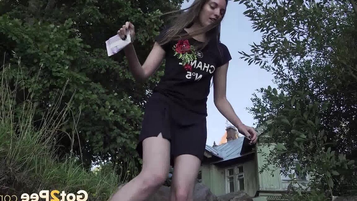 15P Caucasian girl Vika squats for a piss not too far from a big house