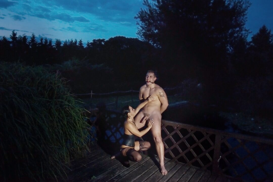 20P Romanian femdom Sandra Romain slaps and fucks her slave's ass on the bridge