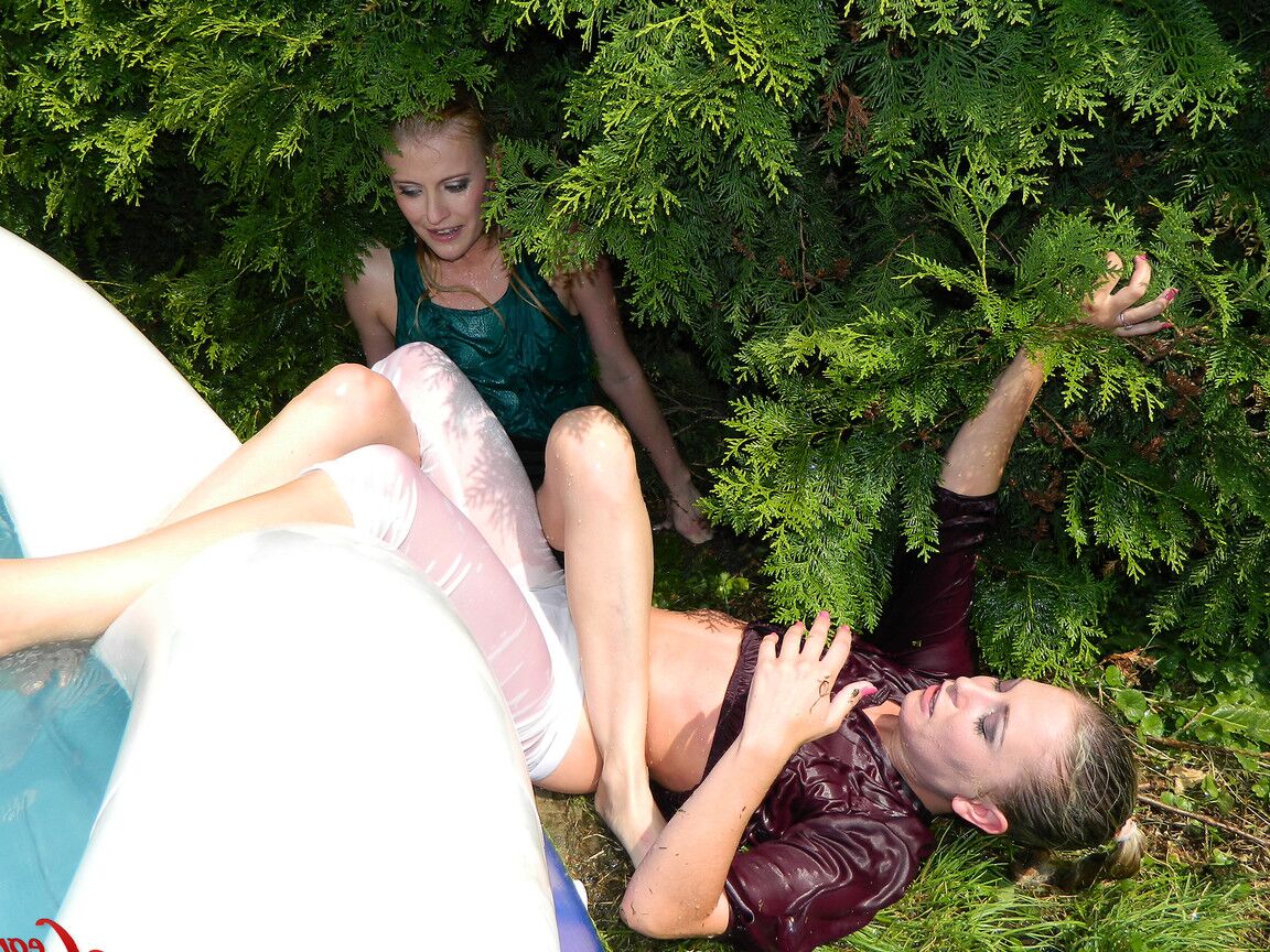 15P Clothed lesbians get soaking wet after getting into an above-ground pool