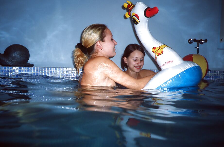16P Sassy teenage cuties revealing their slippy curves by the pool
