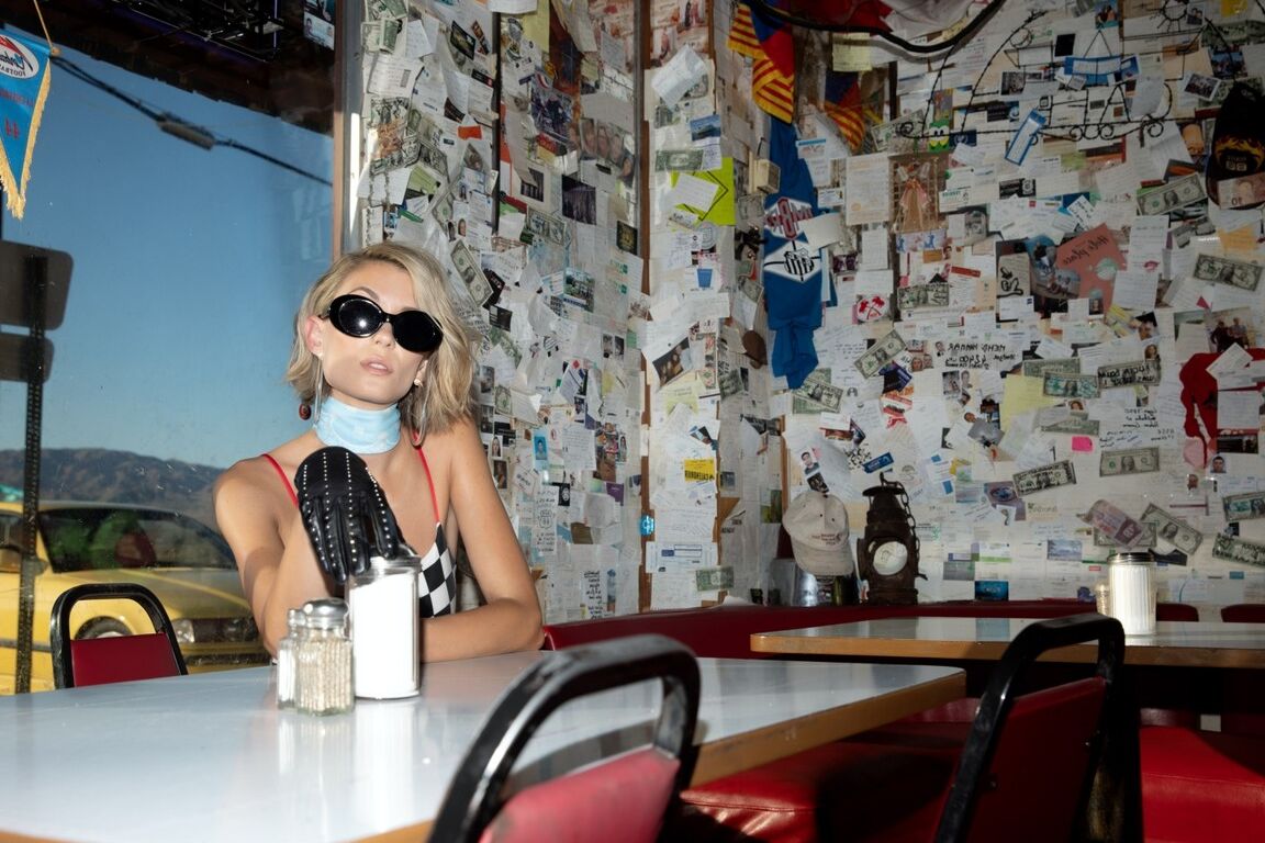 17P Blonde with tiny tits Anna Lisa Wagner teases with her panties in a cafe