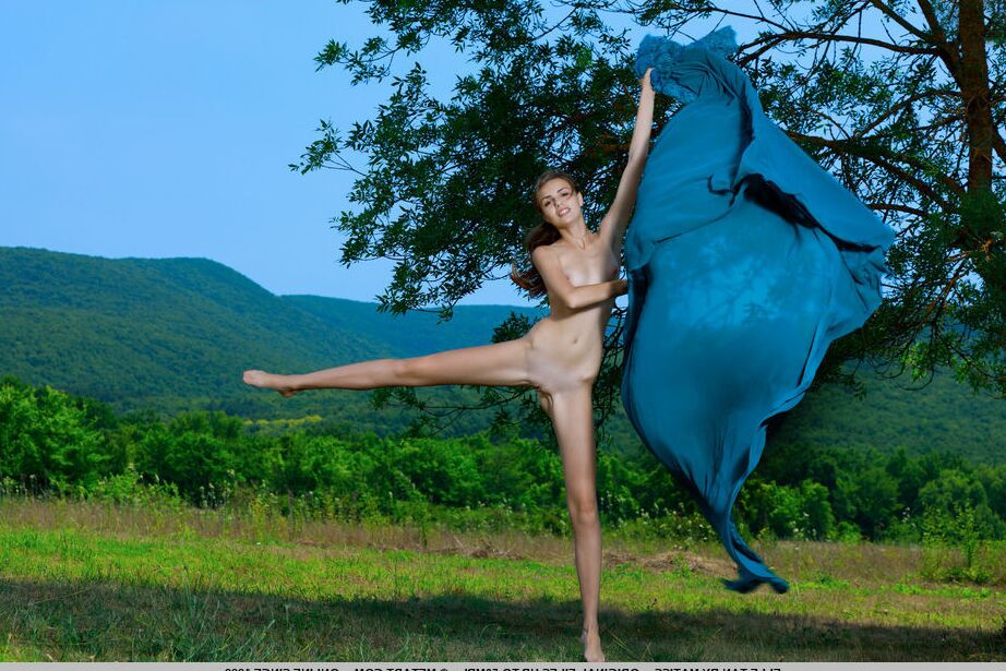 18P Sweet teen Elle Tan gets totally naked on a blanket in a field by a tree