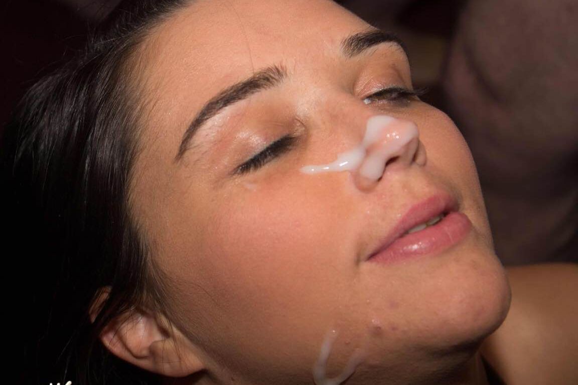 15P British slut gets lots of cum on her face during a bukkake party