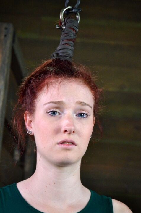 16P Pale redhead Ashley Lane submits to spending a day of her life in bondage