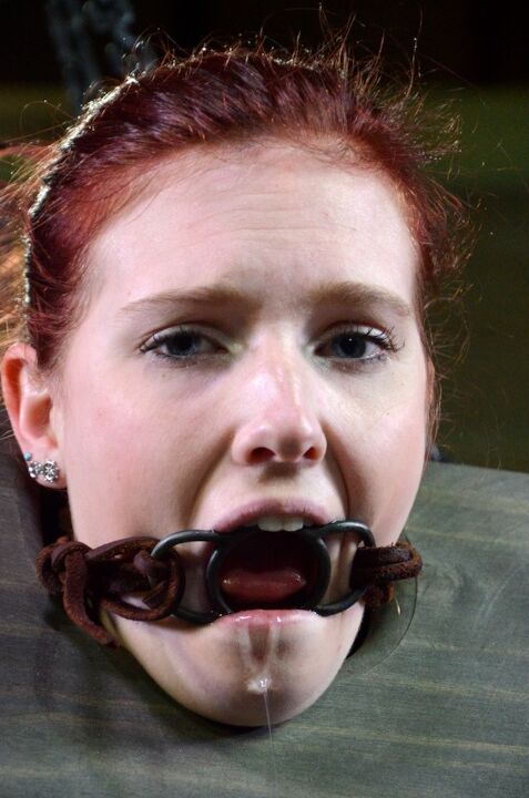 16P Pale redhead Ashley Lane submits to spending a day of her life in bondage