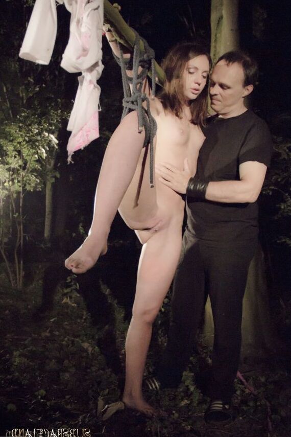 16P Young girl is restrained to a tree in the woods at night for BDSM games