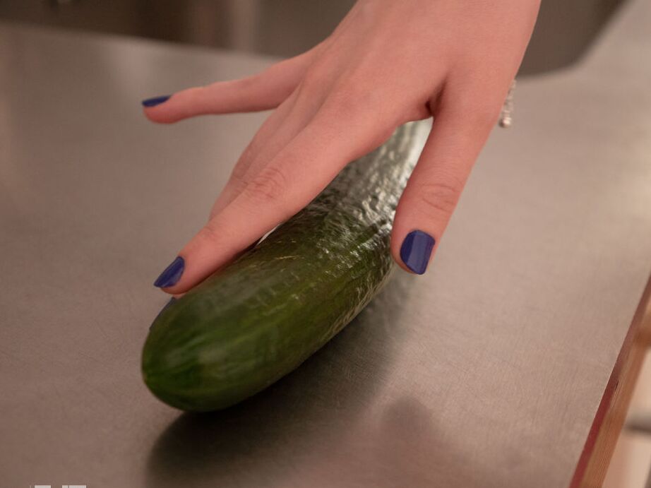 16P Nia Milan sucks on the cucumber like shes going down on it and, as it
