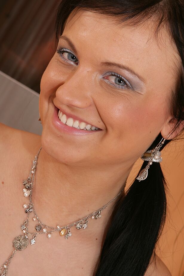 16P Smiley amateur with nice jugs stripping off her clothes and exposing her gash