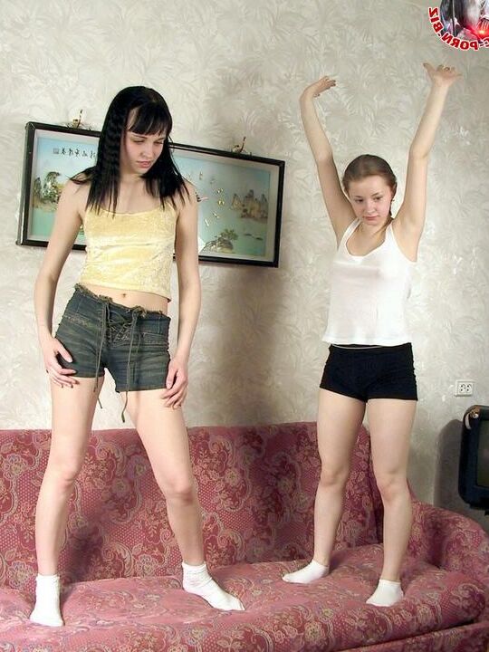 20P Young lesbians help each undress while getting ready for an all girl foursome