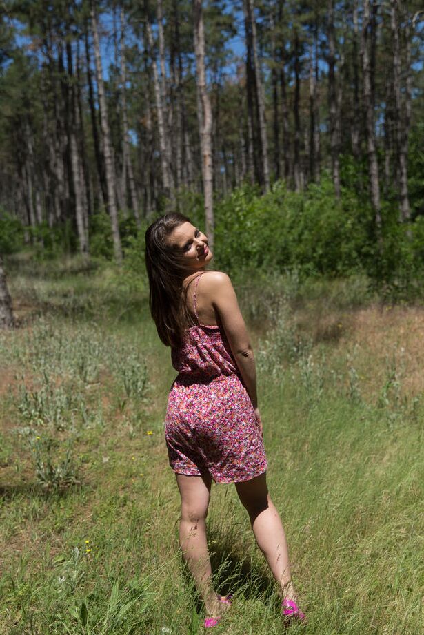16P Nice teen Pola holds a pine cone while modeling totally naked in the woods