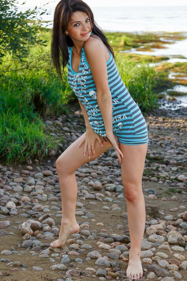 16P 18-year-old brunette Fiona F gets bare naked on a rocky shoreline