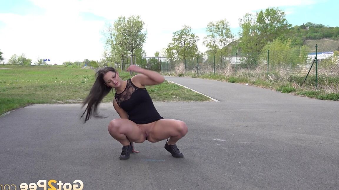 15P Nicolette Noir makes a big piss puddle outside