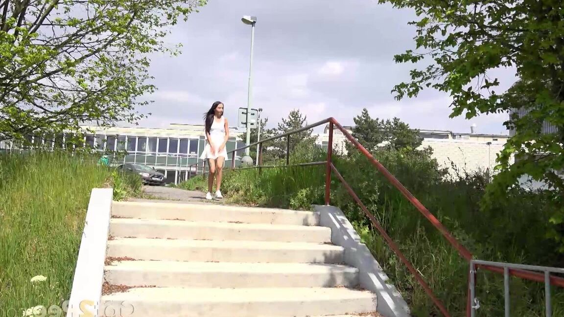 15P Raven haired hottie squats and pees outside