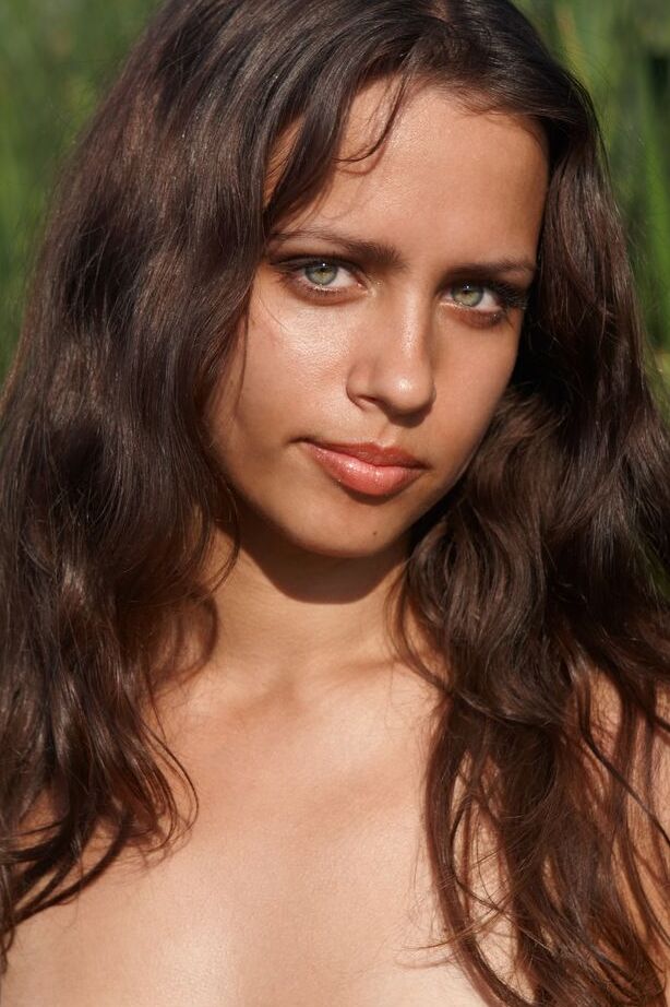 16P Nature loving Arina D plays naked in the water with her hard nipples bared