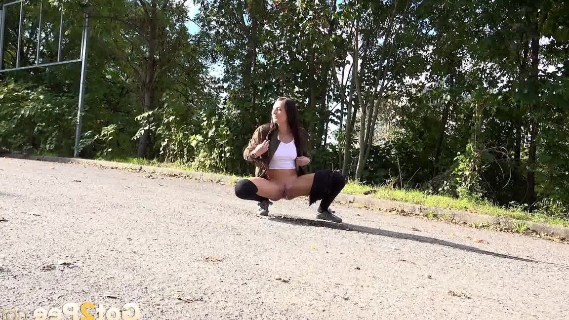 15P White girl Katy Rose takes a piss on a road while wearing hooker socks