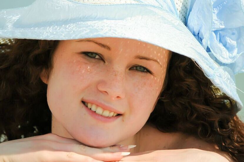 16P Charming 18-year-old Christina F gets completely naked on a sandy beach