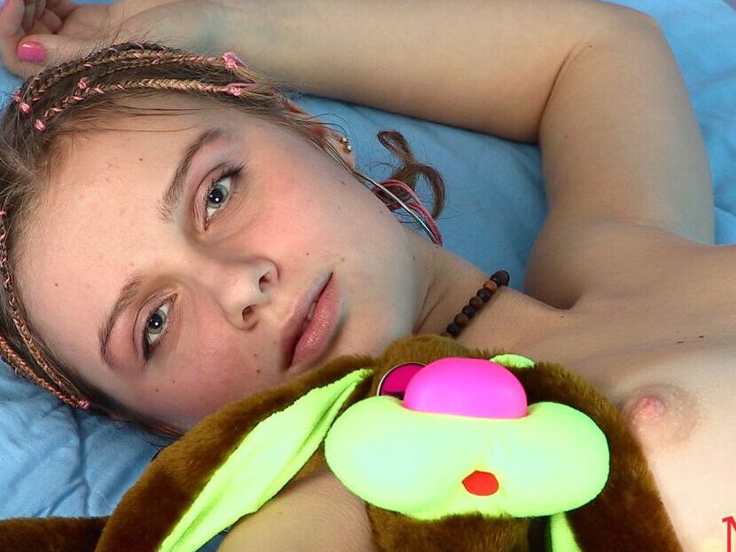 21P Amateur with colorful dreads Tasia undresses and poses on a bed