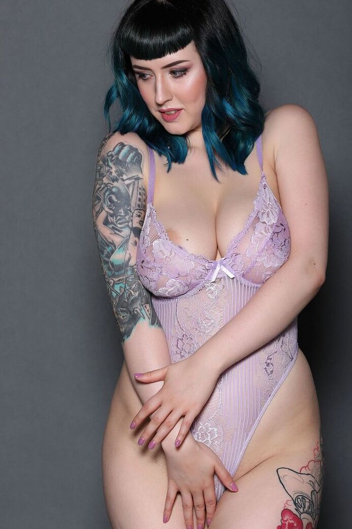 21P Fatty model Lisha Blackhurst displays her inked curves and big juggs & strips