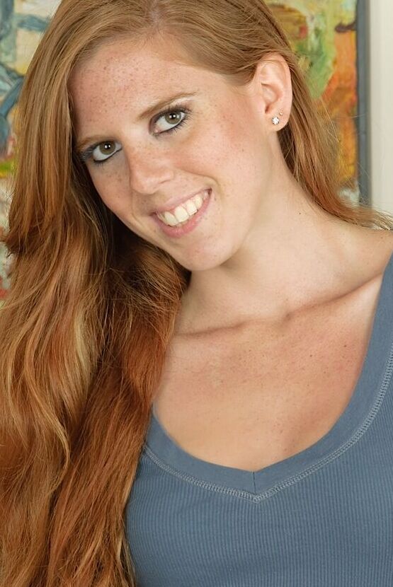 16P Natural redhead Mandy shows her tight ass while masturbating her tight slit