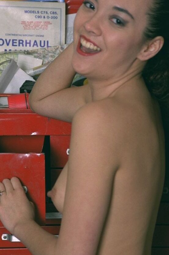 16P Kristyann poses topless on the bike and touches her nipples!