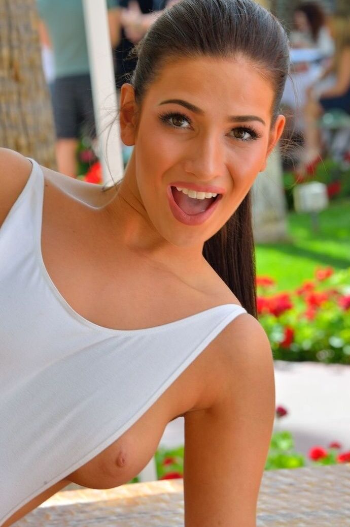 15P Clothed girl teases at an outdoor convention with nip slip and panty upskirts