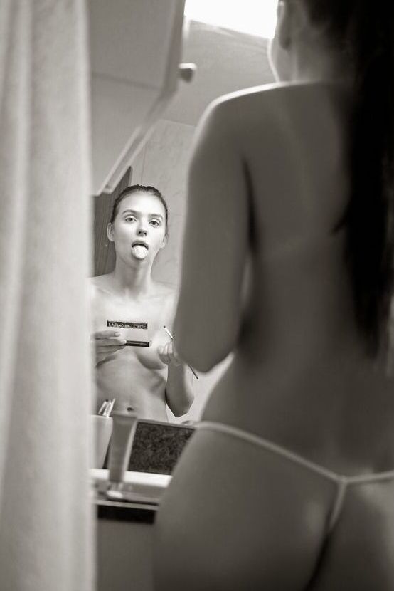 16P Sweet teen Venice Lei does her makeup in a mirror before modelling in the nude