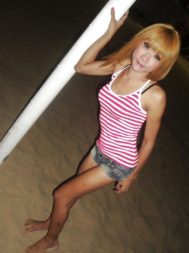 16P Cute redhead Thai ladyboy Nan posing and playing with her small cock