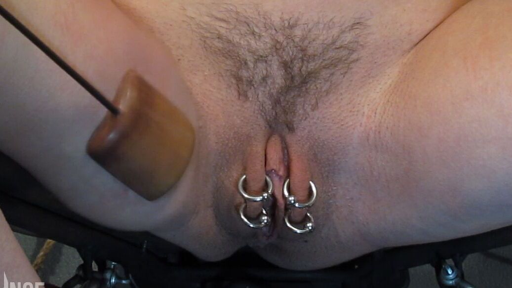 14P Submissive female Abigail Dupree displays her pierced pussy while in bondage