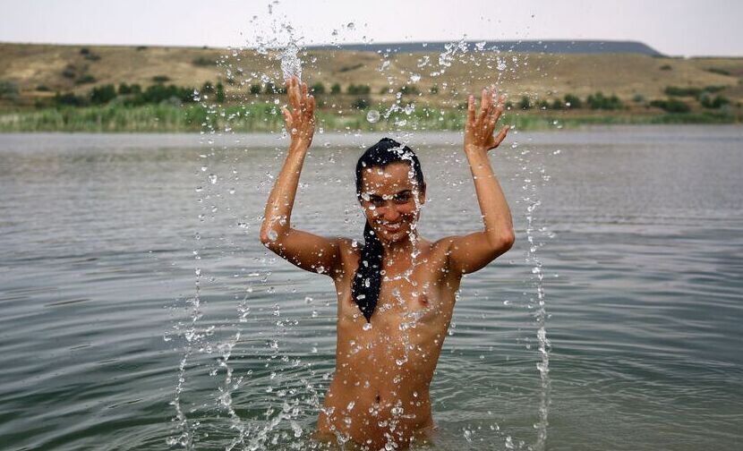 16P Ingaa playfully splashes the water and flaunts her sexy bikini tan lines by