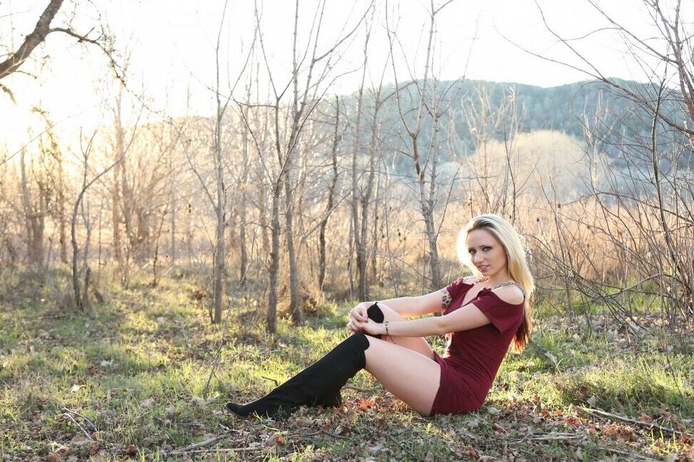 15P Tattooed blonde Lily Xo slides panties aside on a hill in late Spring