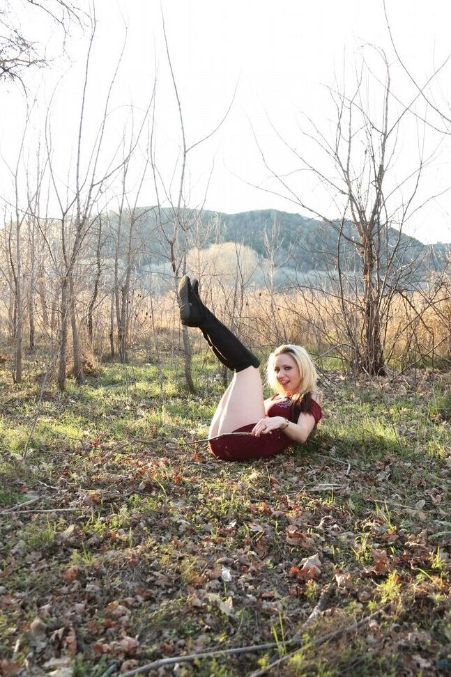 15P Tattooed blonde Lily Xo slides panties aside on a hill in late Spring