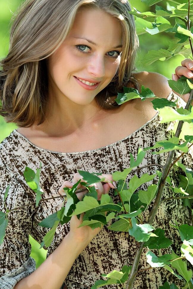 12P Stunning model with small perky tits strips naked in the woods to show hot ass