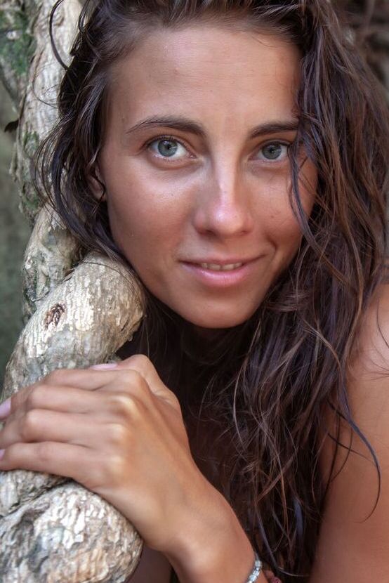 16P Slender college girl Regina C models totally naked in a rocky location