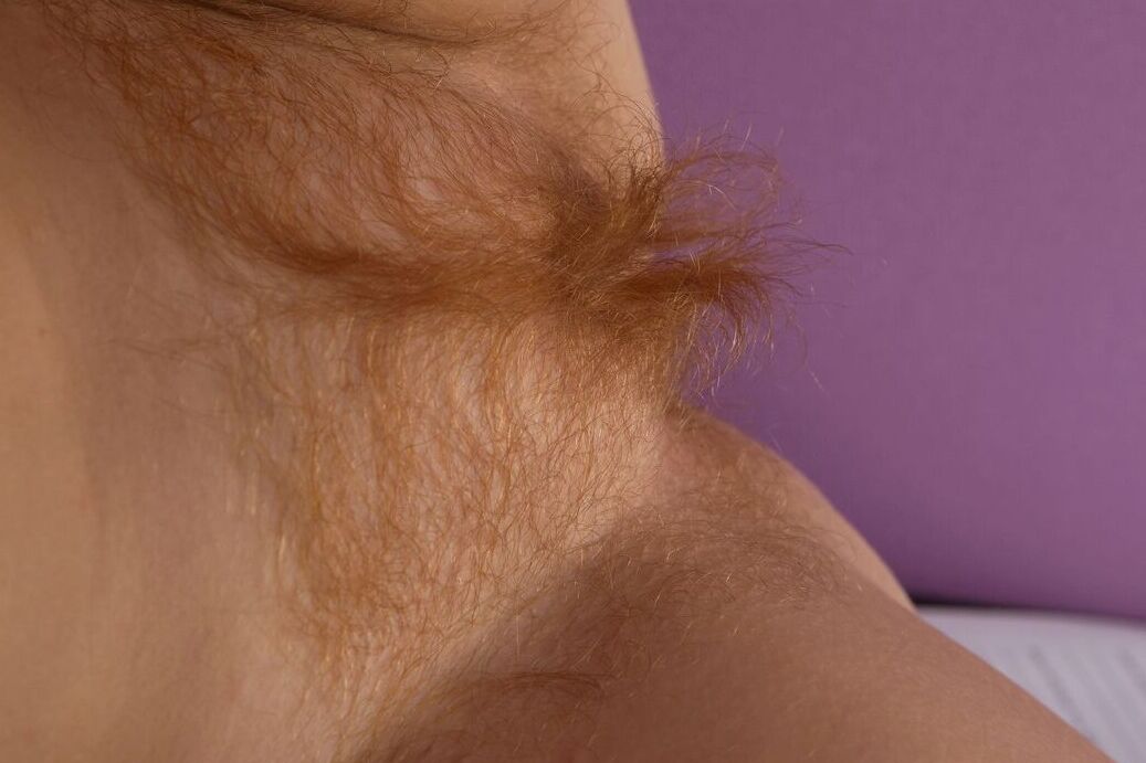 21P Curvy babe Syntia shows her hairy pussy up close while teasing in fishnets