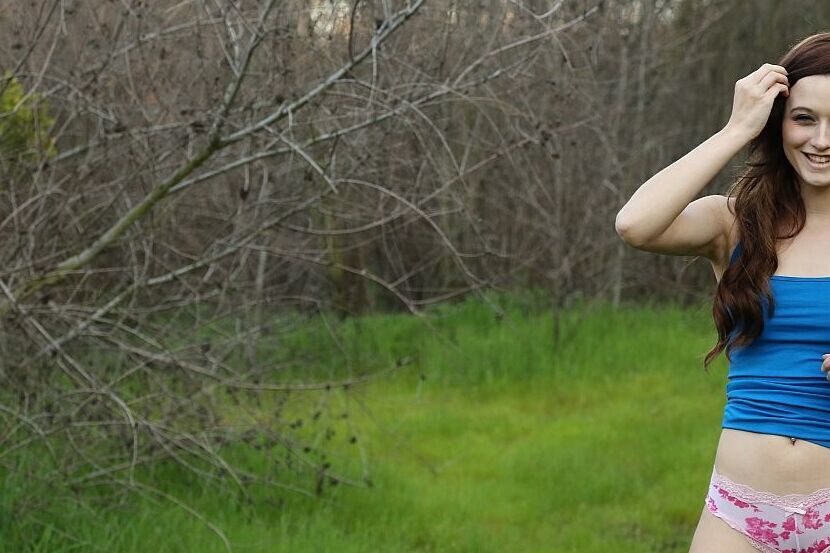 15P First timer Hayden Ryan crawls on lush grass in a bra and panty combo