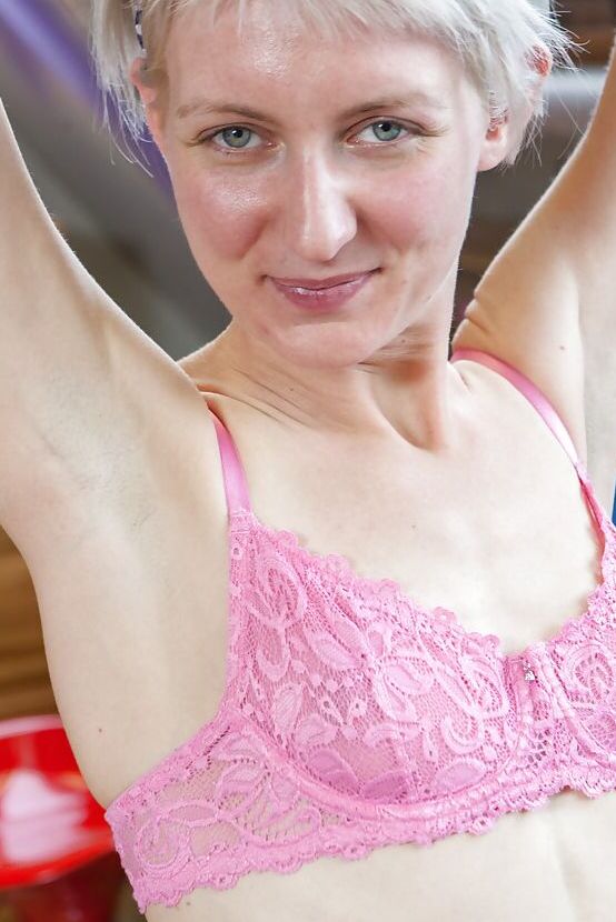 16P Thin amateur girl Poppy B peeling off shorts and panties to pose nude in socks