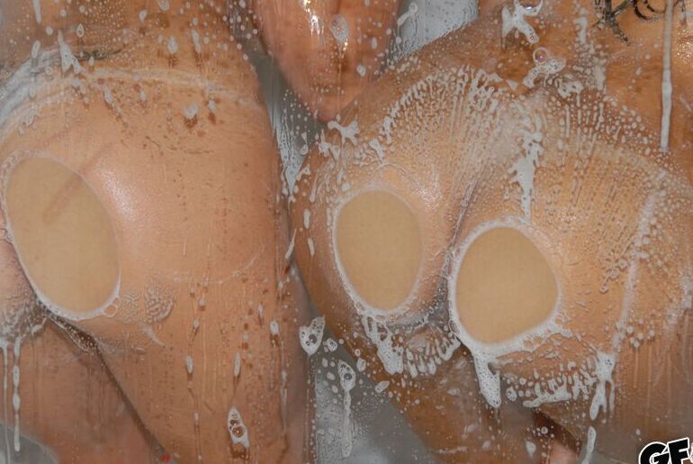 16P Seductive amateurs with big tits have some fun in the shower
