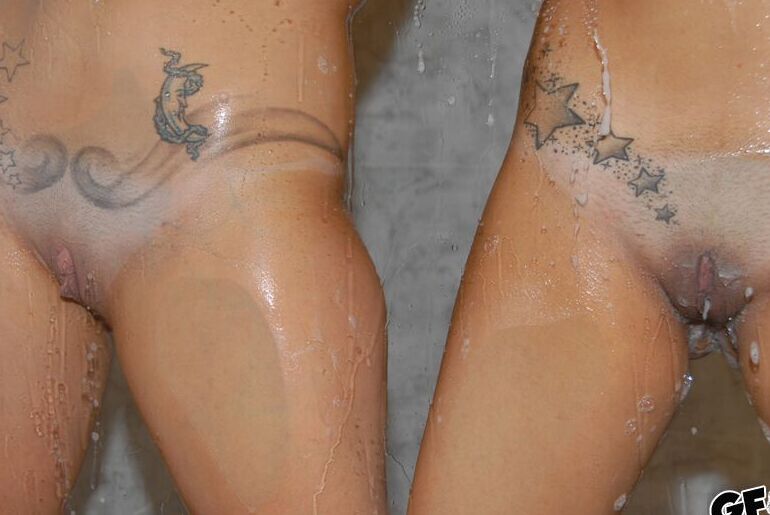 16P Seductive amateurs with big tits have some fun in the shower
